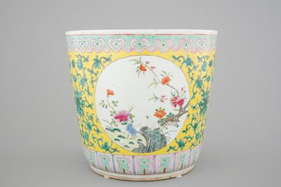 A tall Chinese famille rose yellow ground jardiniere, 19th C.