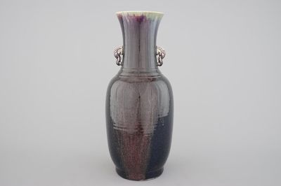 A tall Chinese porcelain flambe glaze vase with elephant handles, 19/20th C.