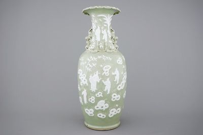 A tall Chinese porcelain white slip on celadon ground vase, 19/20th C.