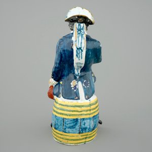 A tall dated Brussels faience jug modelled as a man on a barrel, 18th C. — photo 3