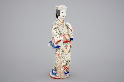 A tall Japanese Arita porcelain model of a “courtesan”, 17/18th C.