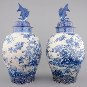 A tall pair of Japanese Arita porcelain blue and white vases and covers, ca. 1860 — photo 1