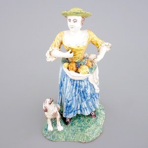 A tall polychrome pottery group of a lady with a dog, Nevers, 18th C. — photo 1