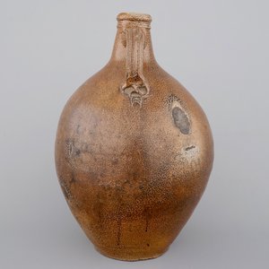 A tall Raeren saltglaze stoneware "Bartmann" or "Beardman" jug, early 17th C. — photo 2