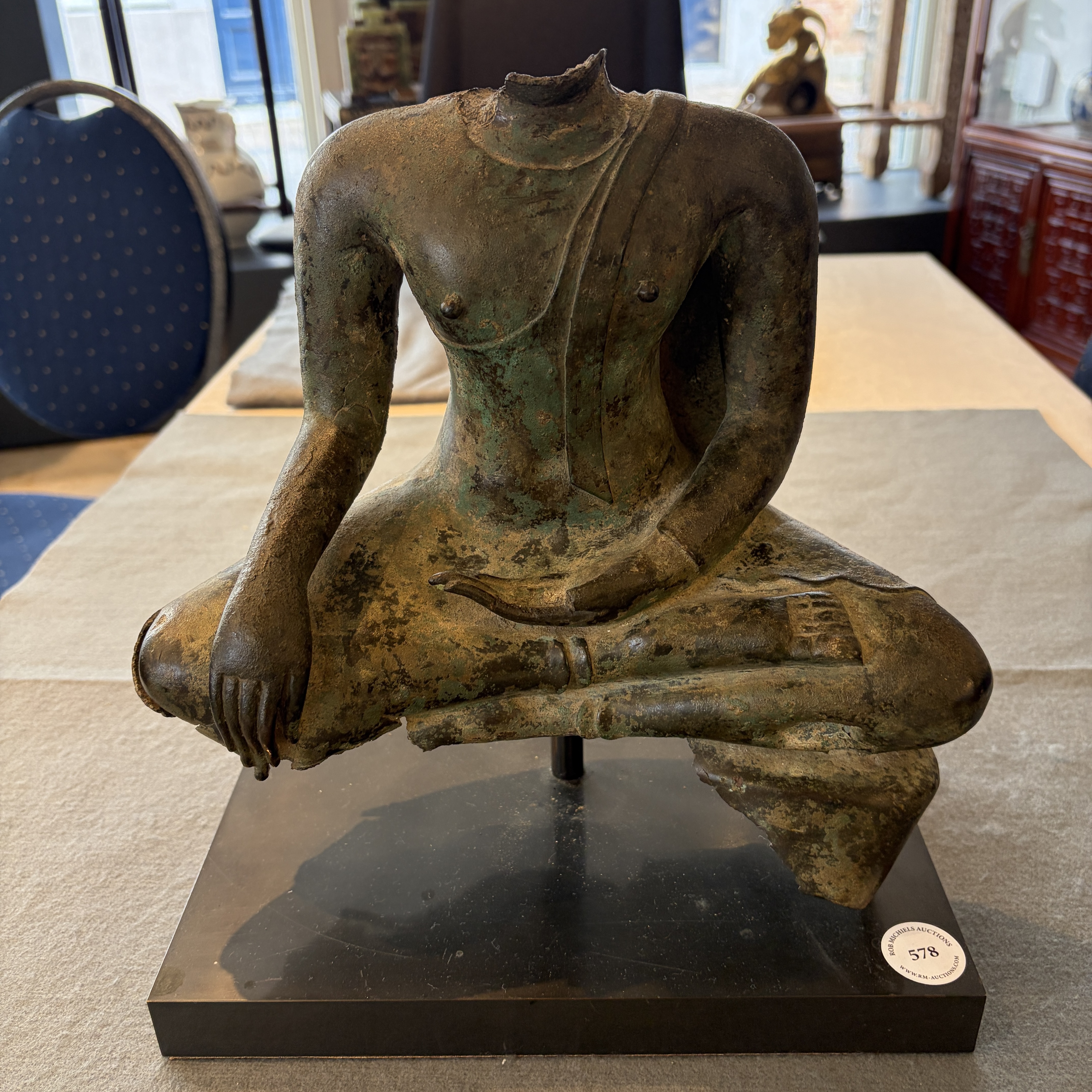 A Thai bronze seated Buddha torso on a later stand — photo 1