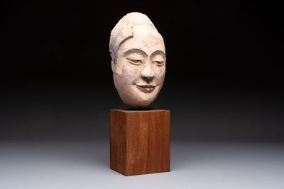 A Thai polychrome stucco head of Buddha, Ayutthaya Kingdom, 16/17th C.