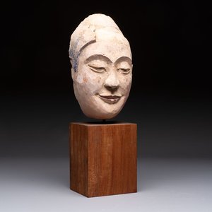 A Thai polychrome stucco head of Buddha, Ayutthaya Kingdom, 16/17th C. — photo 1