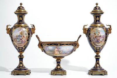 A three piece bronze-mounted Sevres porcelain garniture, 19th C.