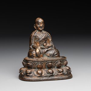 A Tibetan bronze Padmasambhava, 14th C. — photo 1
