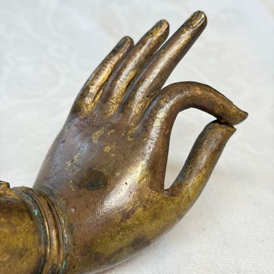 A Tibetan or Nepalese gilt-copper arm — photo 10