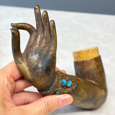 A Tibetan or Nepalese gilt-copper arm — photo 11