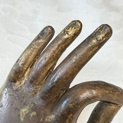 A Tibetan or Nepalese gilt-copper arm — photo 13