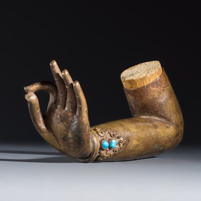 A Tibetan or Nepalese gilt-copper arm, 18/19th C.