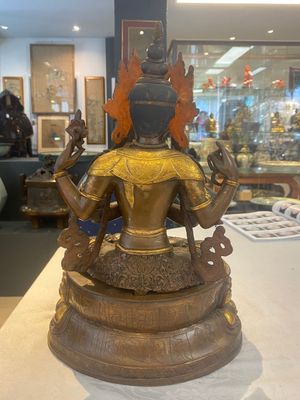 A Tibetan or Nepalese turquoise-inlaid partly-gilt bronze figure of White Tara, 20th C. — photo 11
