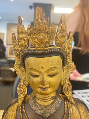 A Tibetan or Nepalese turquoise-inlaid partly-gilt bronze figure of White Tara, 20th C. — photo 12