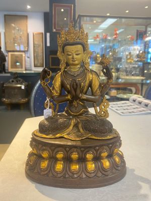 A Tibetan or Nepalese turquoise-inlaid partly-gilt bronze figure of White Tara, 20th C. — photo 13