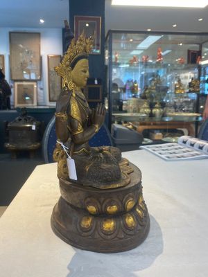 A Tibetan or Nepalese turquoise-inlaid partly-gilt bronze figure of White Tara, 20th C. — photo 14