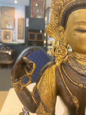 A Tibetan or Nepalese turquoise-inlaid partly-gilt bronze figure of White Tara, 20th C. — photo 7