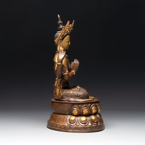A Tibetan or Nepalese turquoise-inlaid partly-gilt bronze figure of White Tara, 20th C. — photo 4