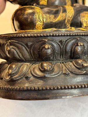 A Tibetan parcel-gilt bronze sculpture of a lama, 20th C. — photo 8