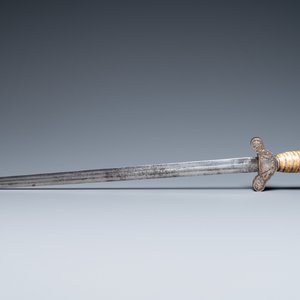 A Tibetan steel sword with silvered copper and mammoth tooth hilt, 19th C. — photo 2