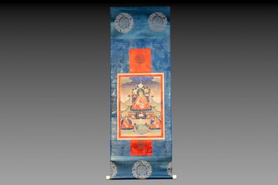 A Tibetan thangka depicting a lama, 19th C.