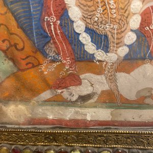 A Tibetan thangka in inlaid gilt brass frame, 19th C. — photo 18