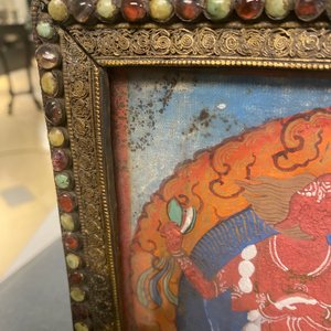 A Tibetan thangka in inlaid gilt brass frame, 19th C. — photo 4