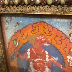 A Tibetan thangka in inlaid gilt brass frame, 19th C. — photo 5