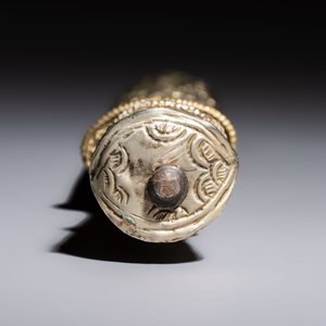 A Tibetan white metal 'Buddhist Symbols' dagger and scabbard, first half 20th C. — photo 5