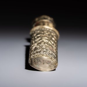 A Tibetan white metal 'Buddhist Symbols' dagger and scabbard, first half 20th C. — photo 6