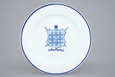 A Tournai porcelain plate with the arms of St.-Sebastian's Archers Guild and inscribed Brugge, 18th C.