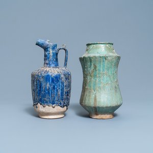 A turquoise-glazed Islamic pottery albarello and a blue-glazed ewer, Iran or Syria, 12/13th C. — photo 1