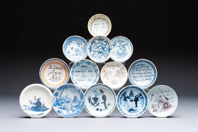 A varied collection of 13 Delftware saucers and bowls, 17/18th C.