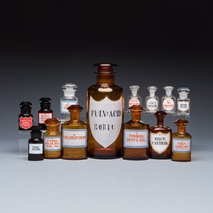A varied collection of 14 glass apothecary bottles — photo 1