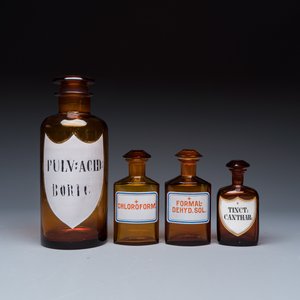 A varied collection of 14 glass apothecary bottles — photo 14