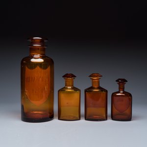 A varied collection of 14 glass apothecary bottles — photo 16