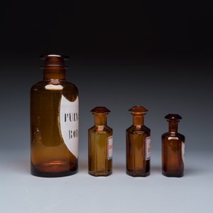 A varied collection of 14 glass apothecary bottles — photo 17