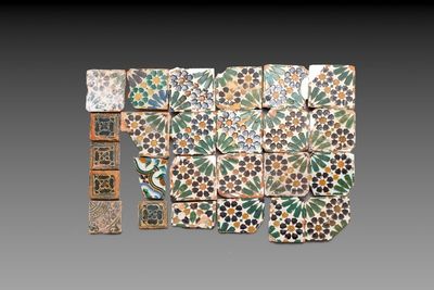 A varied collection of 24 polychrome Spanish tiles, Seville and Valencia, 15/16th C.