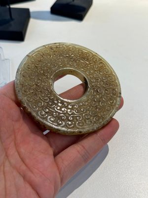 A varied collection of 'bi' discs and jade pendants, China, 1st C. B.C. and earlier — photo 10