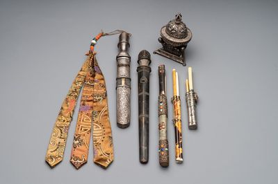 A varied collection of Chinese and Japanese eating set trousses, a Tibetan 'kapala' and two daggers, 18/19th C.