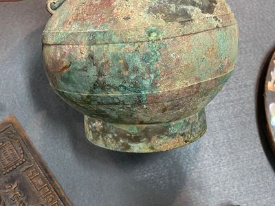 A varied collection of Chinese and Tibetan bronze, brass and wood objects, 19/20th C. — 照片 22