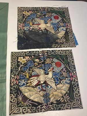 A varied collection of Chinese embroidered silk cloths, a fan-cover and 'rank badges', 19th C. — 照片 31