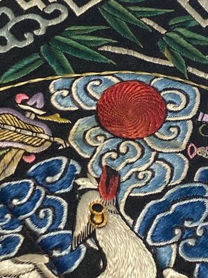 A varied collection of Chinese embroidered silk cloths, a fan-cover and 'rank badges', 19th C. — 照片 33
