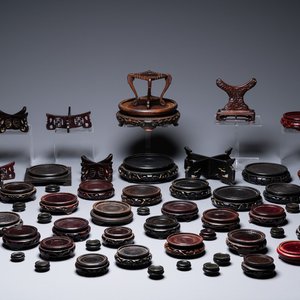 A varied collection of Chinese wooden stands, 19/20th C. — photo 1
