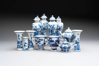 A varied collection of eight Chinese blue and white vases, two teapots and two loving cups, Kangxi/Qianlong