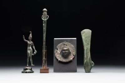 A varied collection of four bronze objects and figures, Roman Empire, 8th C. B.C./3rd C.