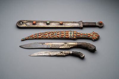 A varied collection of four decorated daggers, two inset with red coral and turquoise, Sri Lanka and Georgia, 18/19th C.
