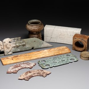 A varied collection of nine Chinese archaistic jade and stone carvings, 20th C. — photo 1