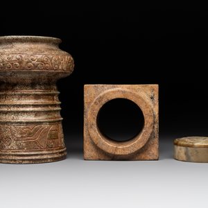 A varied collection of nine Chinese archaistic jade and stone carvings, 20th C. — photo 14